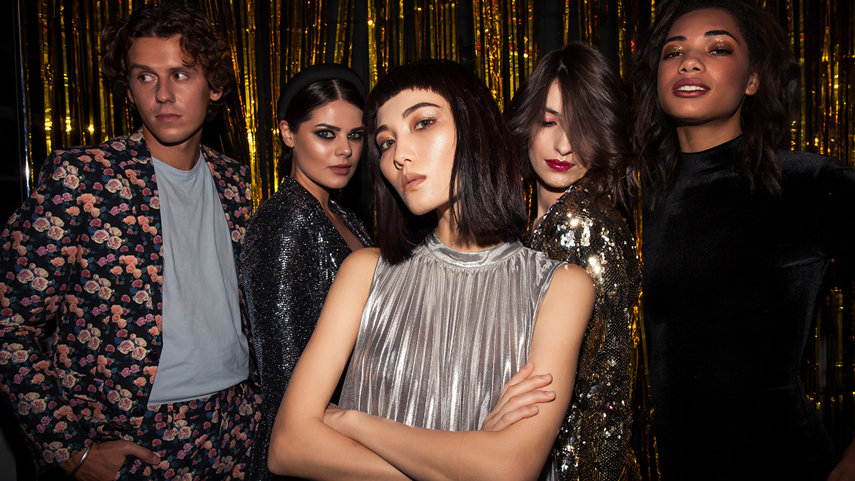 Group of people with glitter in the back